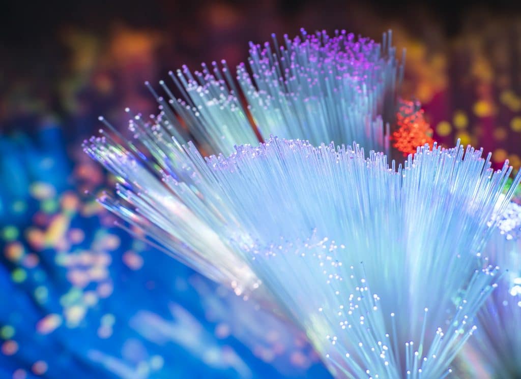 fiber optics network cable for ultra fast internet communications, thin light threads that move information at high speed\.