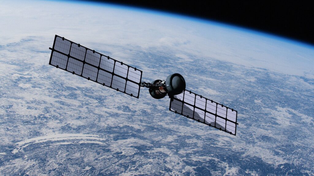 Satellite in space orbiting the planet Earth for space research mission or GPS communications\. NASA Public Domain Imagery